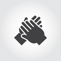 Obraz premium Icon of human hands applause. Symbol of ovation, cheers, clapping. Simple black flat pictogram. Vector illustration for websites, mobile apps, games and other design projects