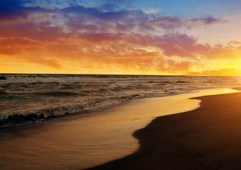 Fototapeta na wymiar Colorful sunset sky above the sea. Nature background.