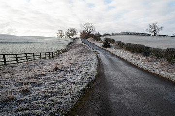 Fototapeta na wymiar Snow on fields and road near Catterick, Yorkshire, England