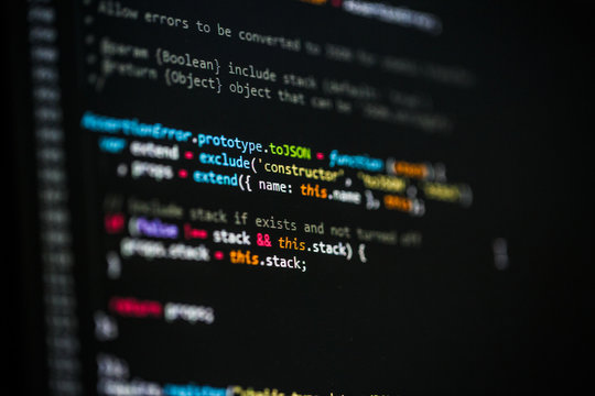 Software developer programming code