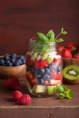 fruit salad in mason jar strawberry blueberry kiwi apple mint