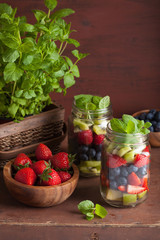 fruit salad in mason jar strawberry blueberry kiwi apple mint