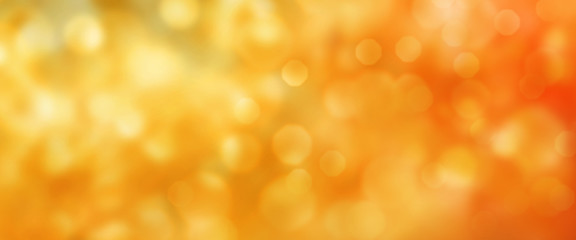 Abstract golden autumn bokeh background