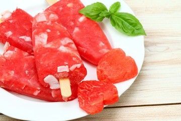 Homemade ice lolly from water melon &  almond pieces
