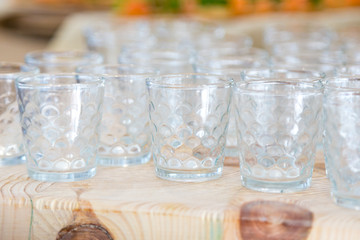 Empty glasses are on the table