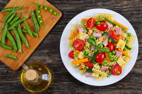 fusilli pasta with vegetables and ham