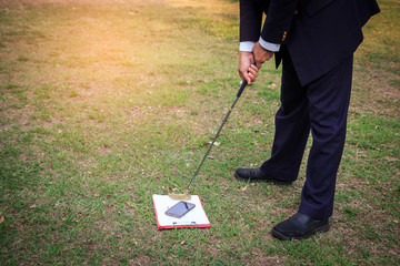 Abstract business man  preparing to shoot clipboard and smartphone in reduce stress at work....