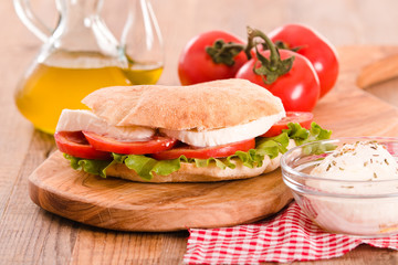 Puccia bread with mozzarella and tomato. 