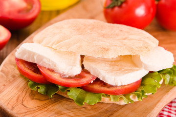 Puccia bread with mozzarella and tomato. 