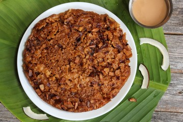 Kalathappam - Steamed Rice cake with jaggery, coconut oil shallots from Malabar, Kerala