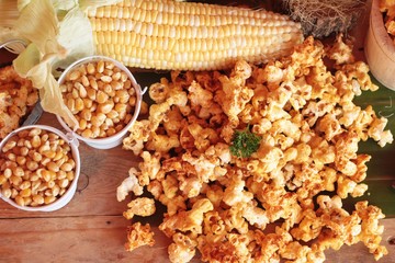 Popcorn with butter and fresh corn cob