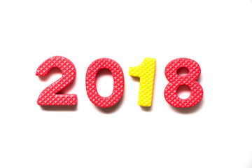 Toy foam alphabet in wording 2018 on white background (Concept for Happy new year decoration)