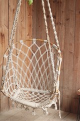 Obraz premium close up hanging chairs swing in a corner