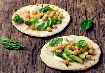 Flatbread with chickpea and avocado.