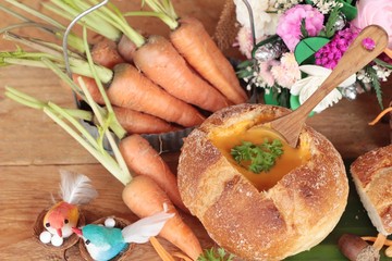 Carrot cream soup with bread is delicious