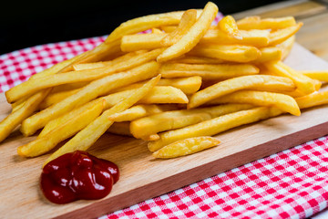Golden French fries potatoes ready to be eaten