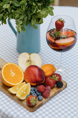 Delicious Red Sangria with fruits on table