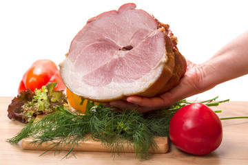 Big piece of pork loin in his hand