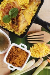 chicken biryani with rice delicious and sauce