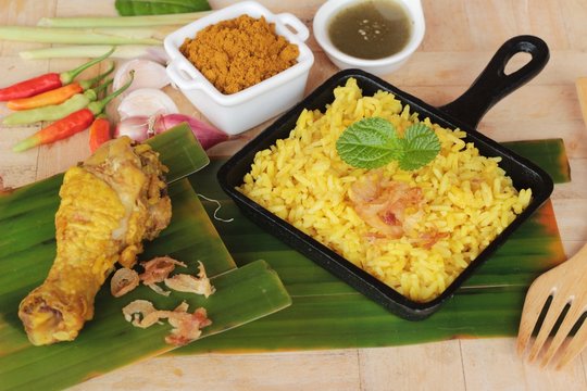 chicken biryani with rice delicious and sauce