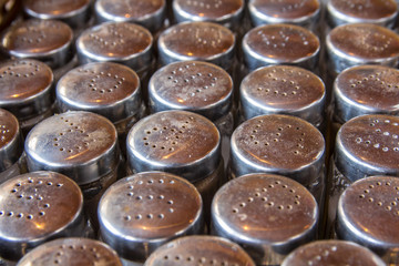salt and pepper shakers in a restaurant