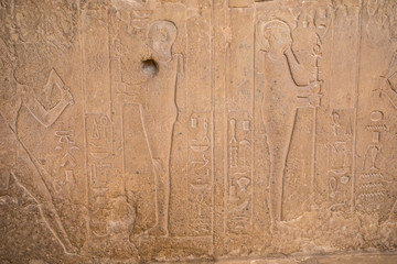 Drawings and paintings on the walls of the ancient Egyptian temple