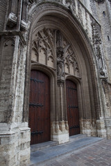 Fototapeta na wymiar Medieval architecture style of door at St. Bavo's Cathedral in Ghent Belgium