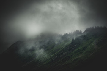 Stormy, cloud shrouded mountains and terrain