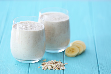 Fresh tasty smoothie with in glasses on table