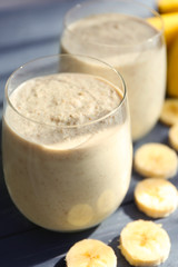 Glasses with tasty fresh smoothie on table