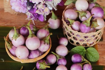 Fresh eggplant purple organic on wood background