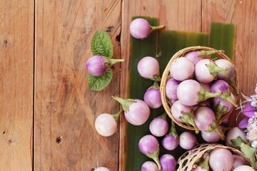 Fresh eggplant purple organic on wood background