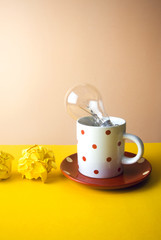 coffee with idea light bulb and paper