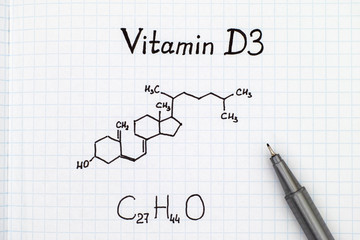 Chemical formula of Vitamin D3 with pen.