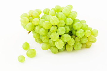 Bunch of green grapes on white background.