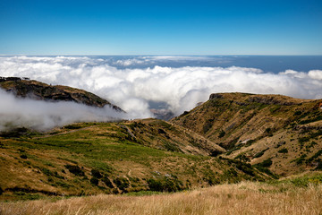 Madeira mountains and cruise ship between clouds
