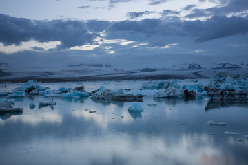 Iceland - Blue ice floes swimming in glacier lagoon joekulsarlon at vatnajoekull