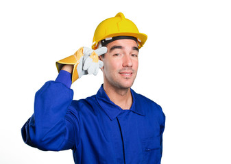 Young worker with a gesture of concentration on white background