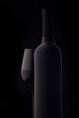 Bottle and a glass of red wine