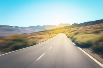 highway road in desert landscape , motion blur - Powered by Adobe