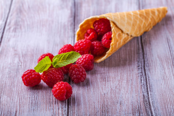 Sugar waffle cone with forest berries horizontal
