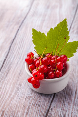 Sugar waffle cone with forest berries Vertically