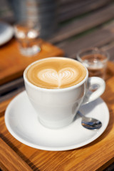 Two cups of cappuccino on the table