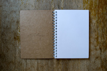 Notebook is white and brown