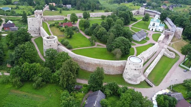 Ancient fortress Izborsk. Drone flight over old medieval stronghold in Izborsk.