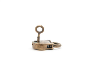 Vintage lock and key isolated on white background.