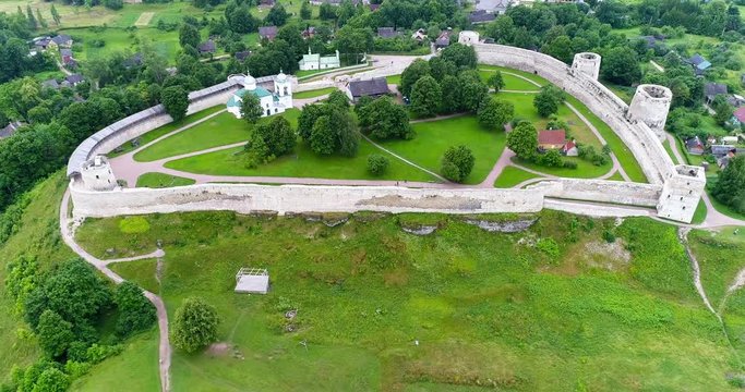 Ancient fortress Izborsk. Drone flight over old medieval stronghold in Izborsk.
