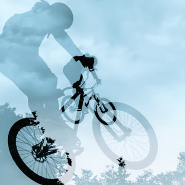 Close-up Of Double Silhouette Of Unidentified Young Man Doing Jump With Bmx Bike Against Blue Sky. Extrem Sport And Risk