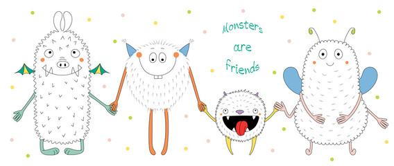 Fototapeta na wymiar Hand drawn vector illustration of cute funny monsters smiling and holding hands, with text Monsters are friends.
