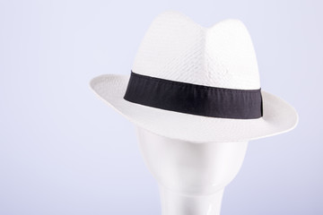 White straw hat on the head of a dummy